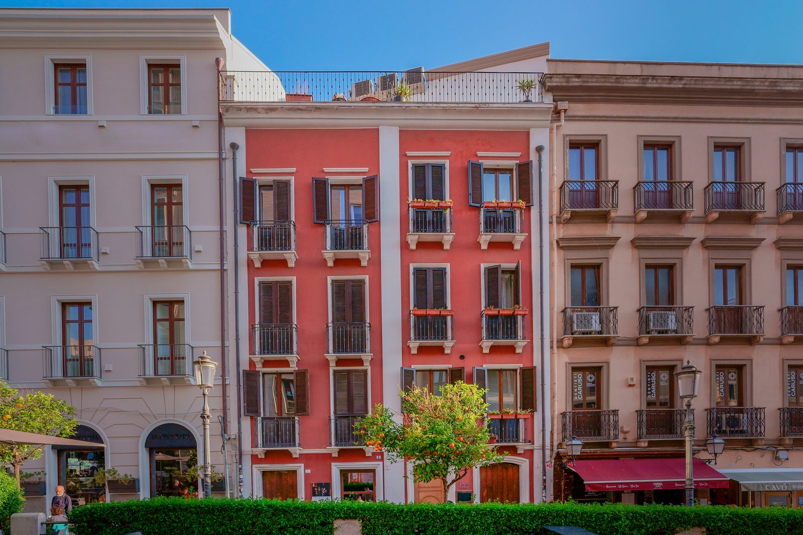 The red townhouse of Le Suite sul Corso, view from Corso Vittorio Emanuele
